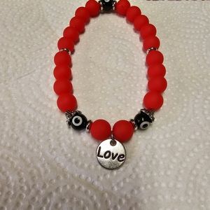 Men's charm bracelet by Kutie Pei Jewelry